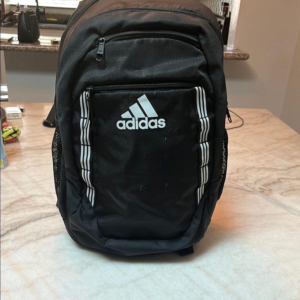 Adidas Black Backpack with Durable Fabric and Zipper Closure